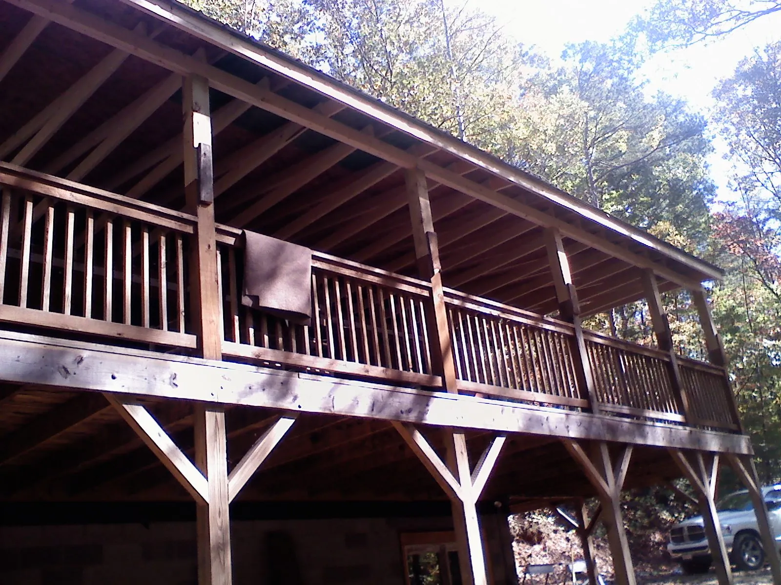 Timber framing under a new elevated porch and deck — Roof Leak Repair in Rowland Heights by Roofing Brothers